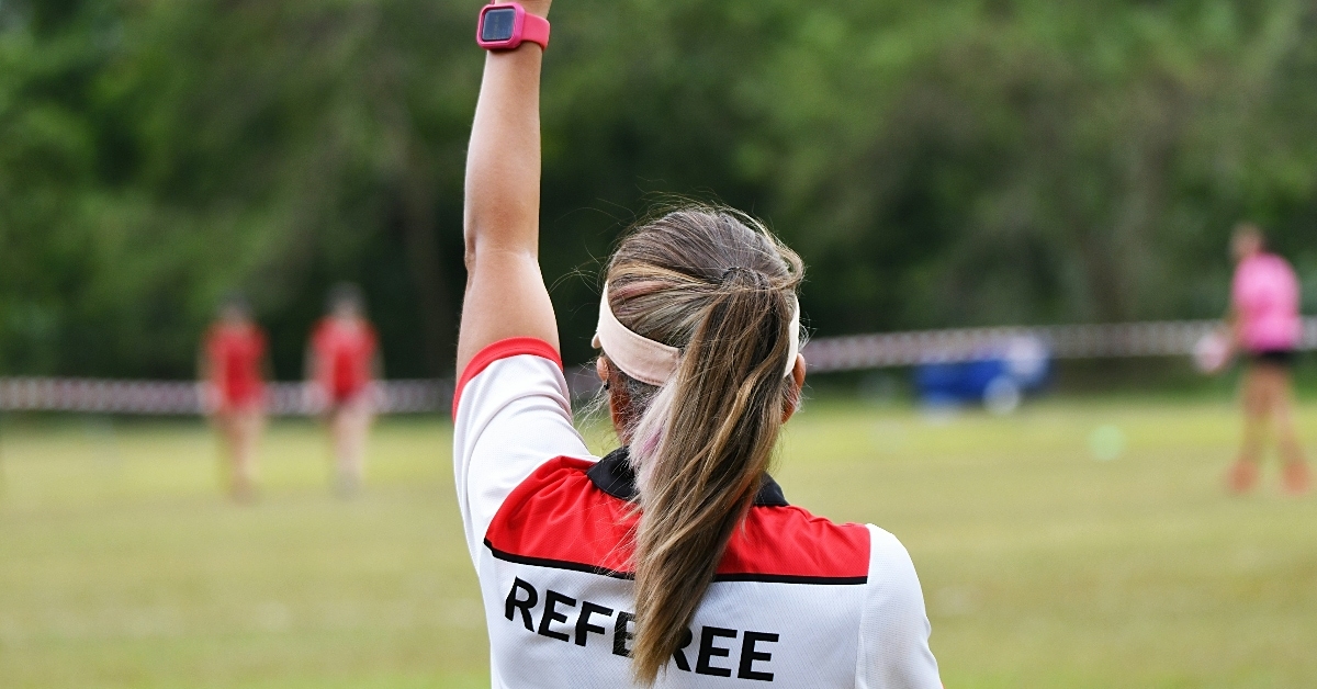 Female referee during sports game